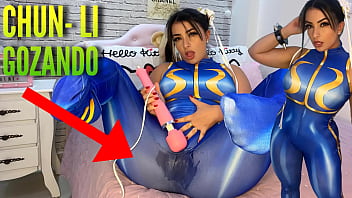 Super-sexy cosplay chick dressed as Chun Li from street fighter playing with her htachi wand cumming and wetting her panties and pants ahegao